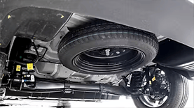 This Kia EV has a space-saving spare tyre ready for emergency roadside fixes.