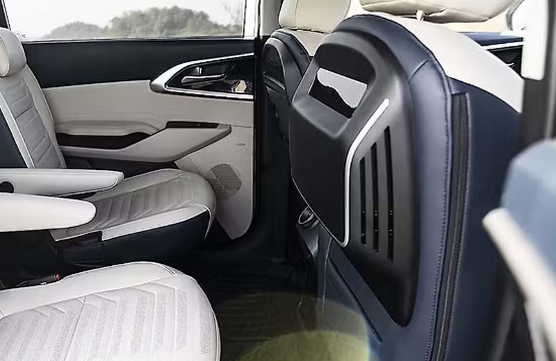 The rear sunshade curtains and ventilated front seats enhance passenger comfort during long drives in warm weather.
