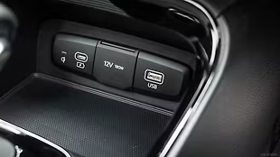 The Sonet includes a Type-A and Type-C port, a 12V socket, and a wireless charging pad for front-row convenience.