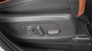Powered driver’s seat with lumbar support, multi-way adjustment, and memory recall for convenience.